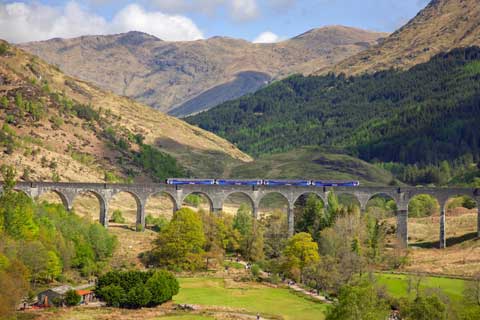 A ScotRail train crossing the Glenfinnan Viaduct